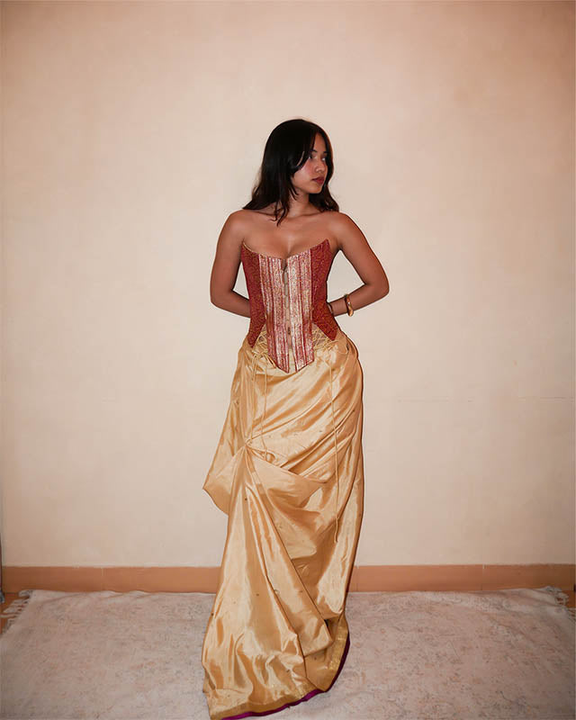  Inspired by the graceful way women have long tucked their garments at the waist for comfort and freedom of movement, this one-of-a-kind skirt blends cultural heritage with contemporary design.