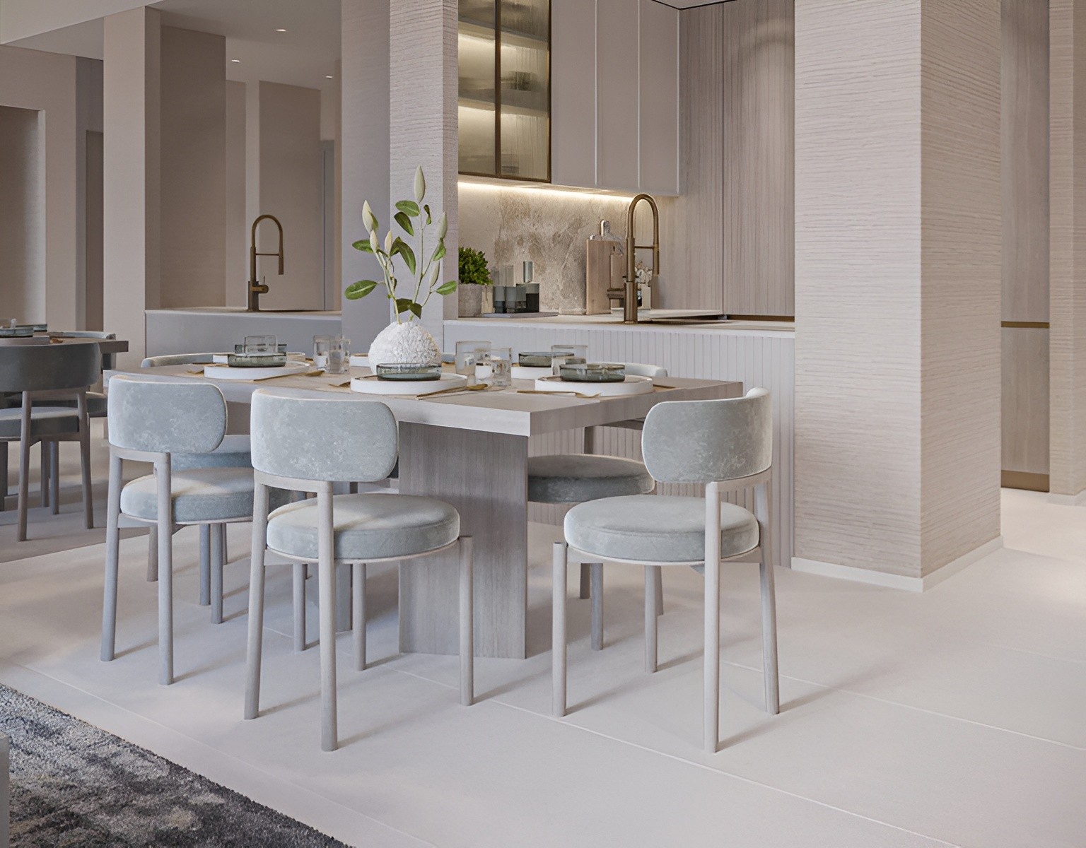 Contemporary kitchen and dining space showcasing elegant furnishings and modern appliances, created by Belle Vie by Zimaya.