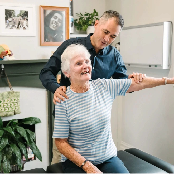 Elderly women getting chiropractic adjustment