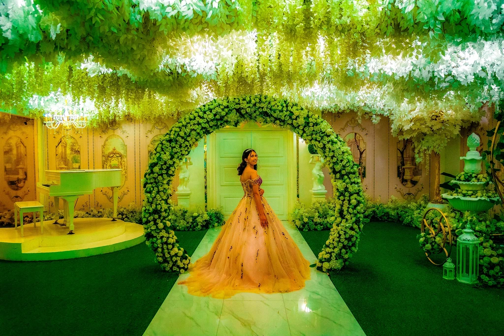 Debutante in a peach ballgown on the Cinderella carriage at Celestia Hall, Quezon City