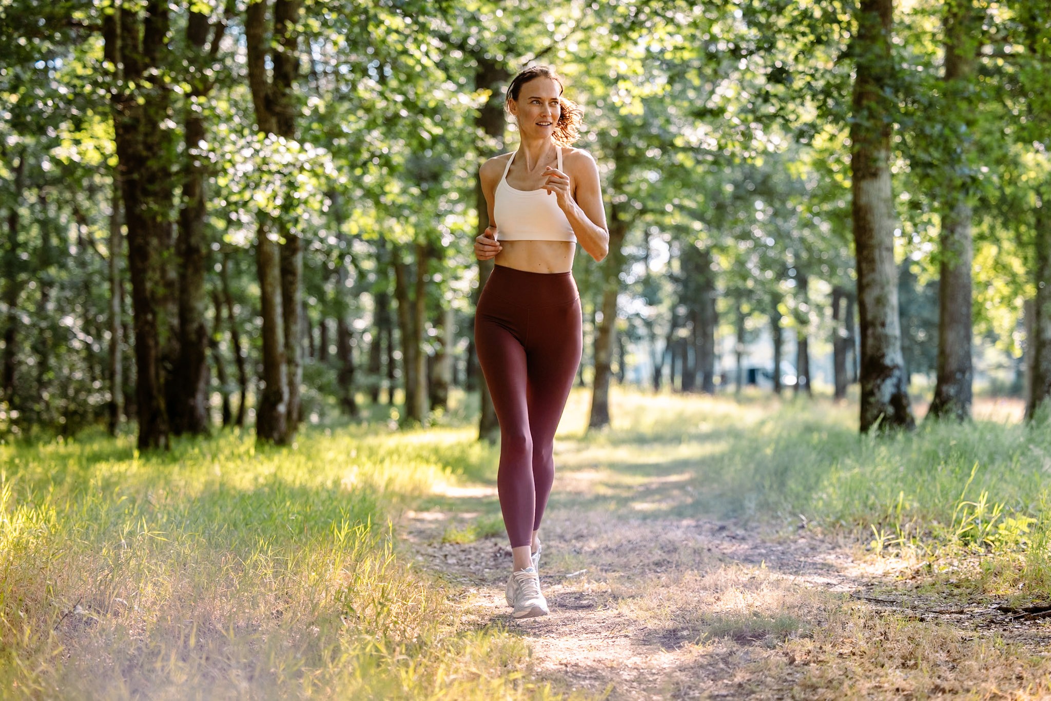 Jogging through Les Bordes Estate woodlands