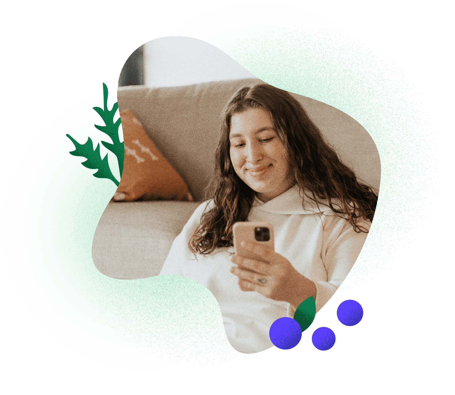 Woman smiling at her phone learning her nutrition therapy is covered by insurance