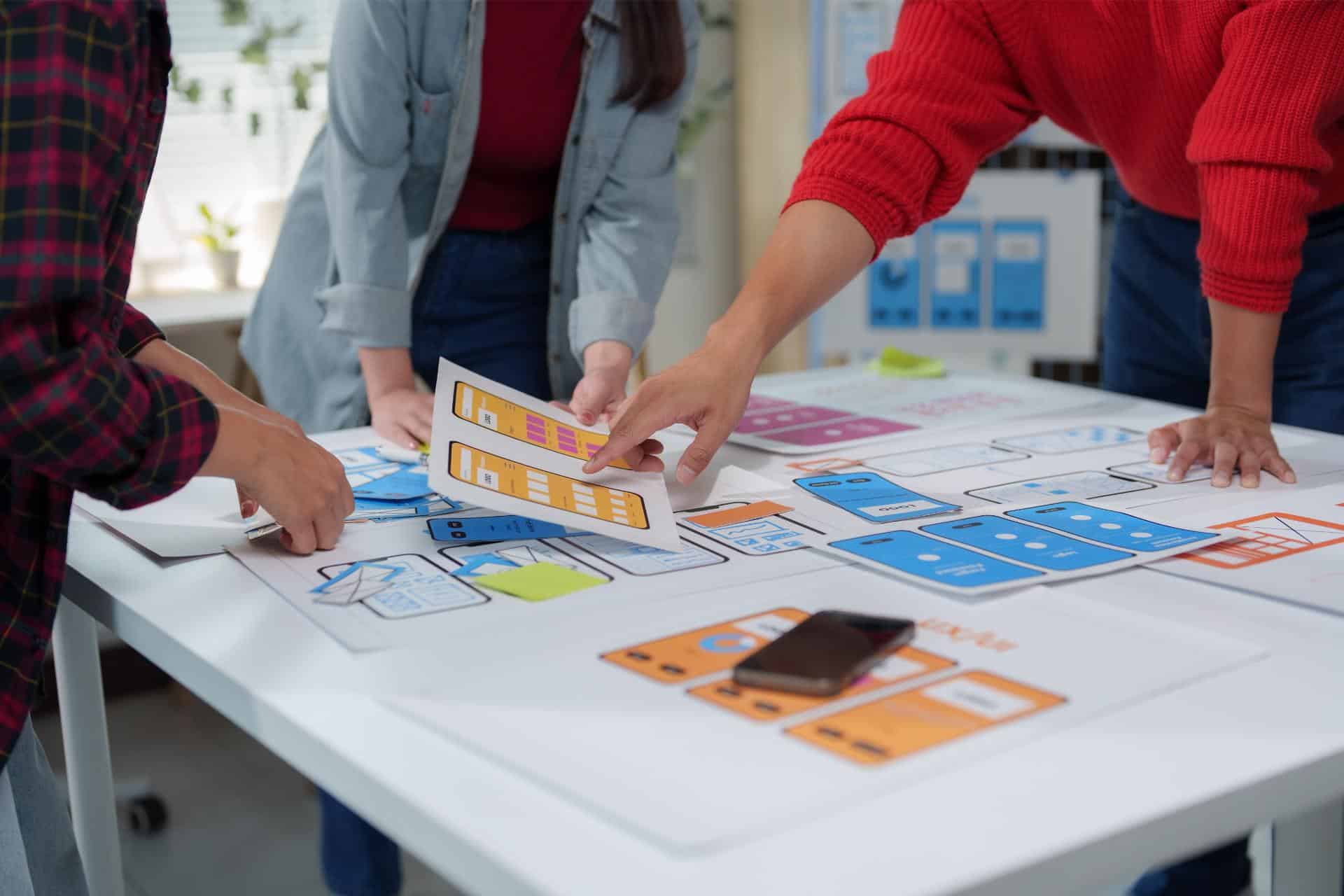 Uiux designers are working together to create a user friendly mobile application