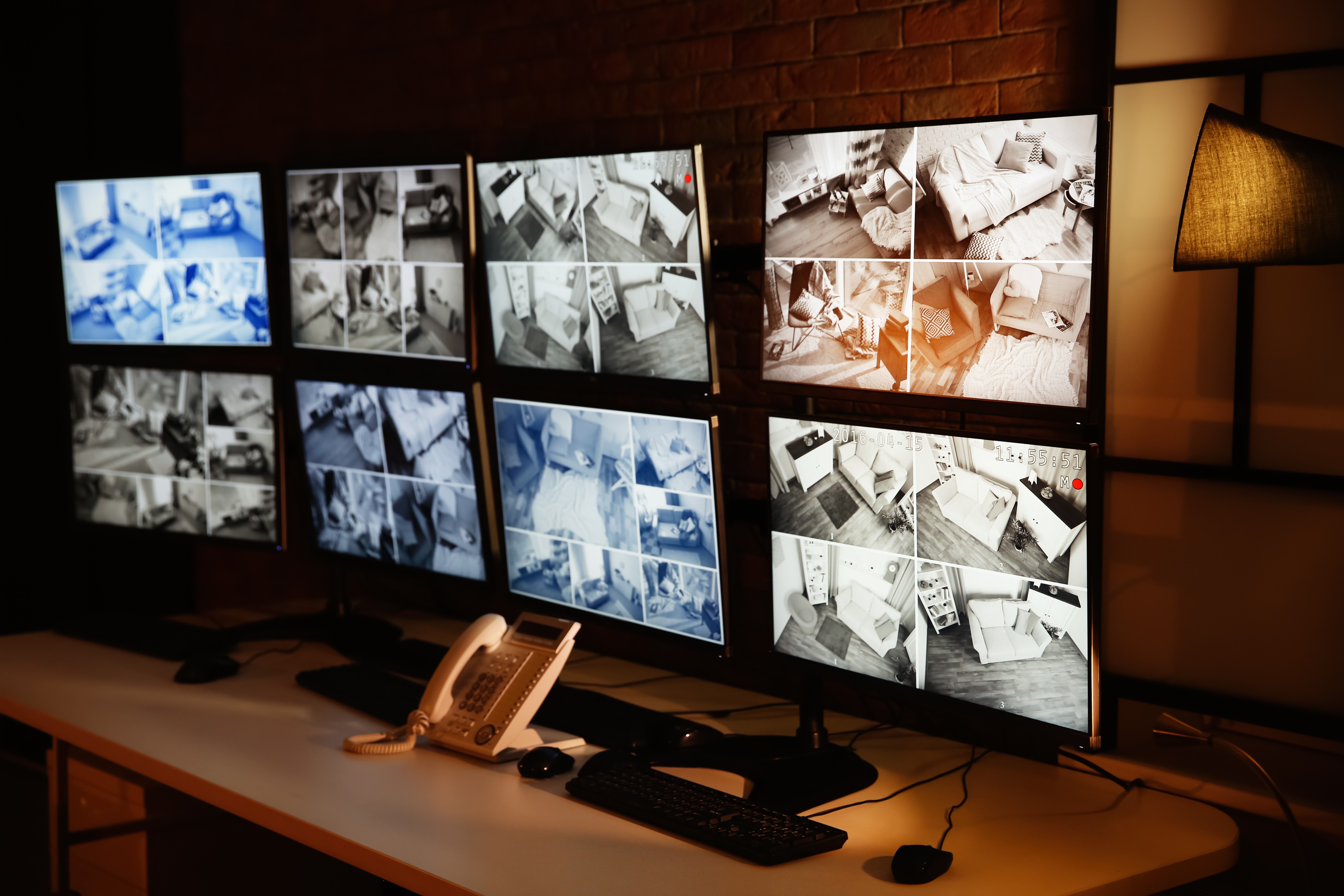 Mointors showing CCTV camera feed.