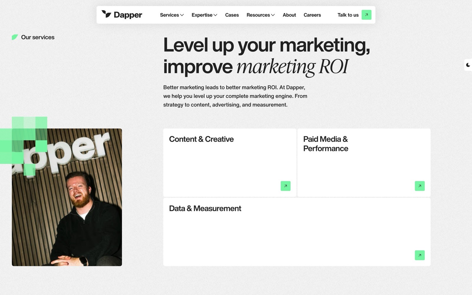 Website with "Dapper" logo, text on improving marketing ROI, and menu items like "Content & Creative" and "Paid Media & Performance.