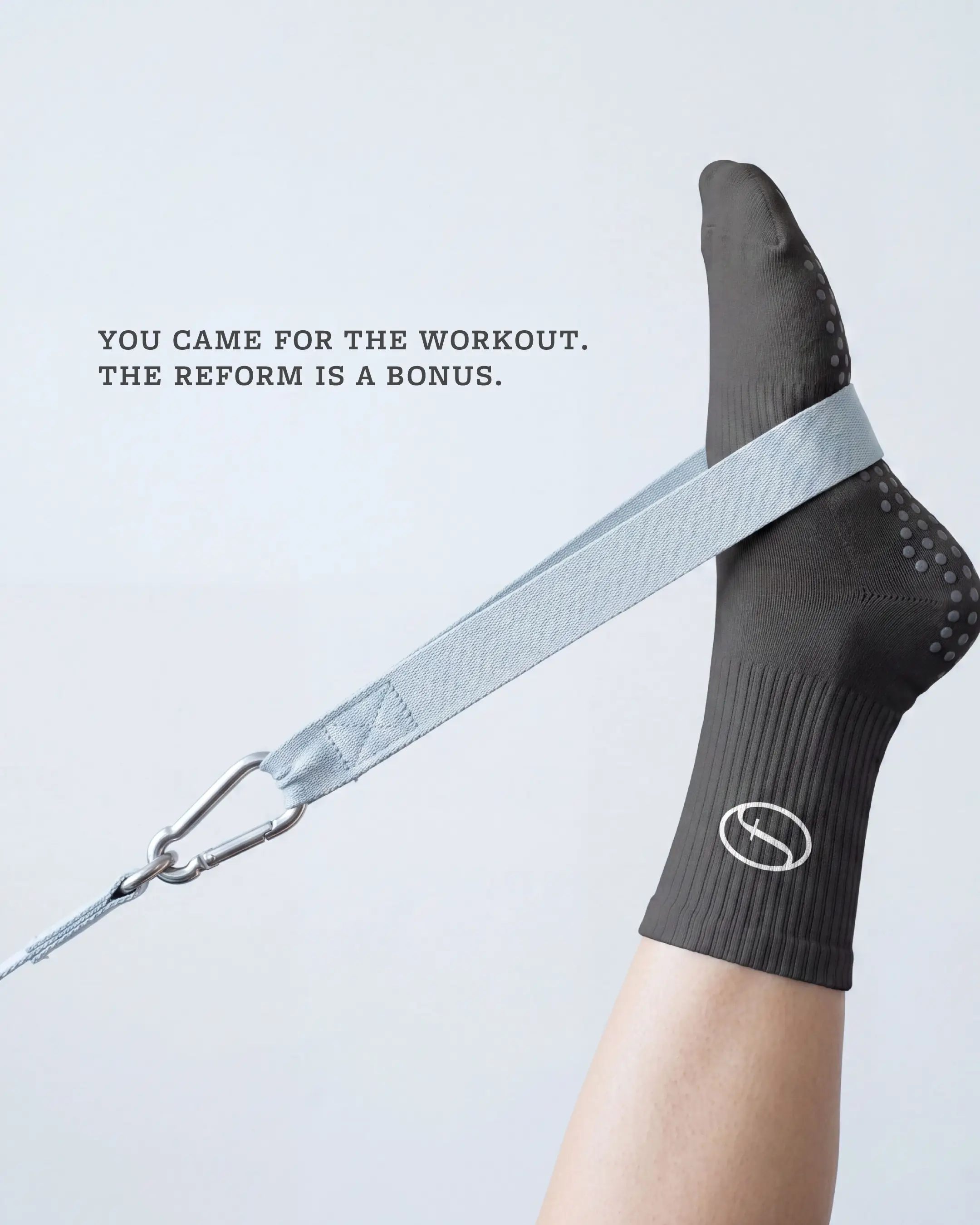 Reformr Pilates Studio brand identity — campaign image of leg extended on reformer strap with tagline: you came for the workout, the reform is a bonus