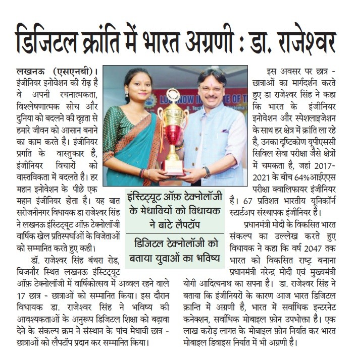 man standing in front of people sitting beside table with laptop computers