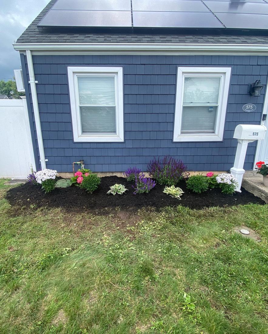 Topel Industries crew work on a Long Island property
