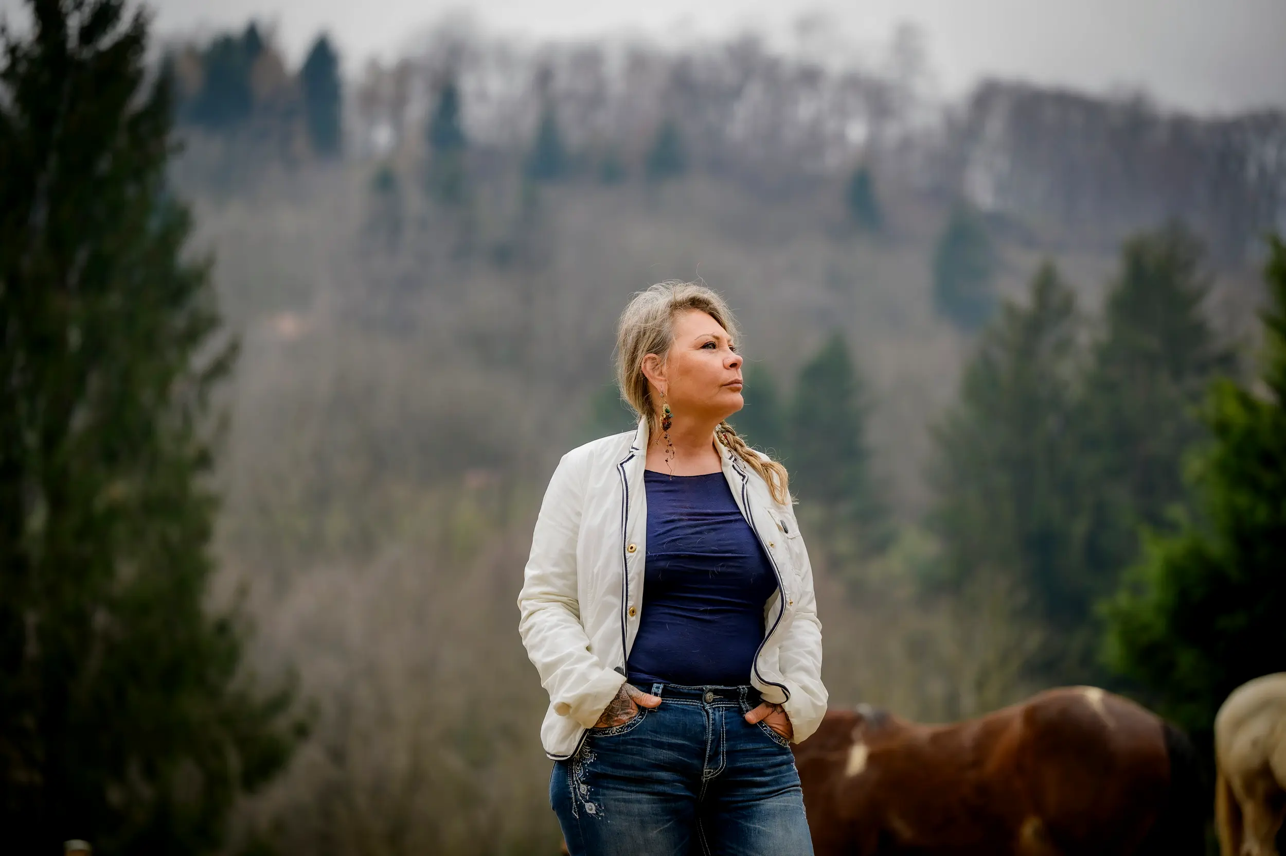 Woman sitting cross legged meditating in a mindfulness vibe