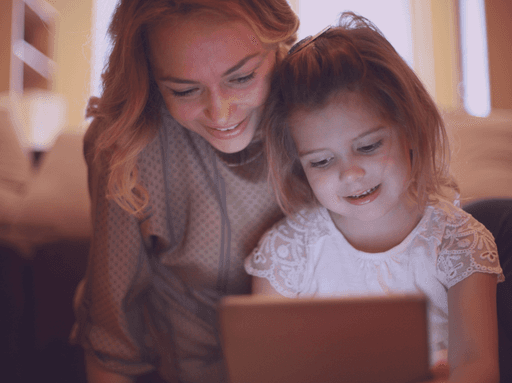 Mother and daughter emotionally speaking with a deceased family member through Glimpse's AI-powered video.