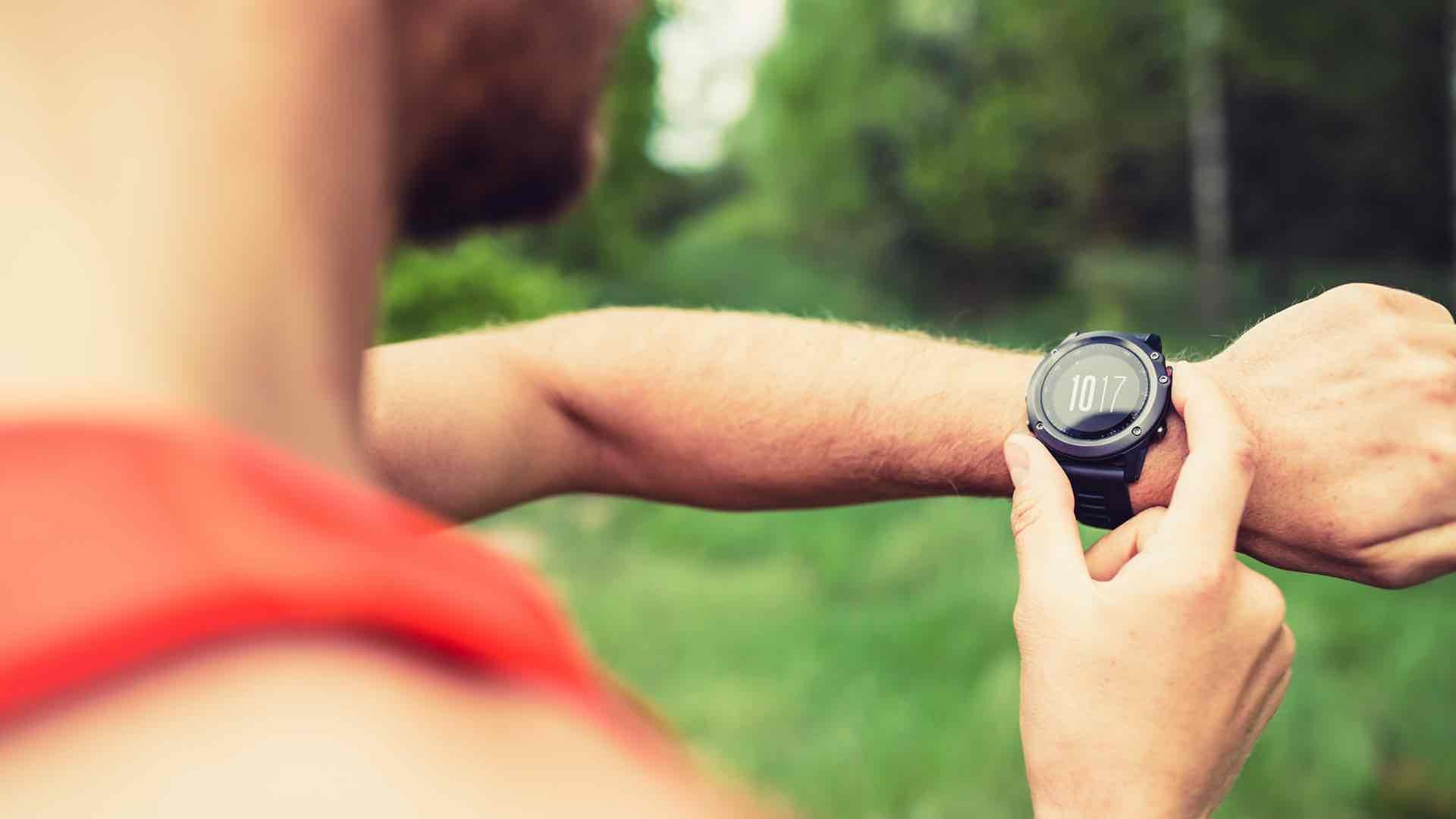 man looking at his watch