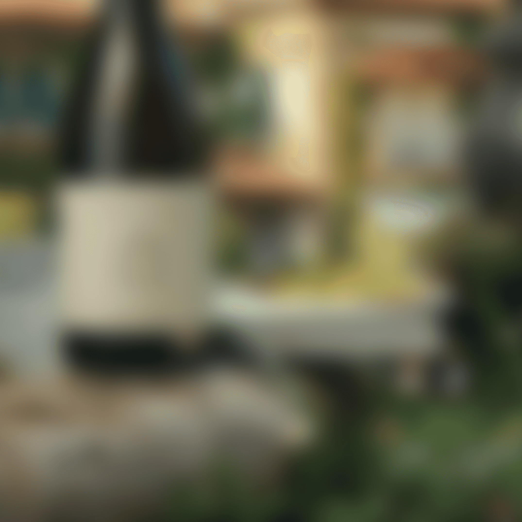 Blurred close-up of a grey device with two black lenses glowing orange and green light.