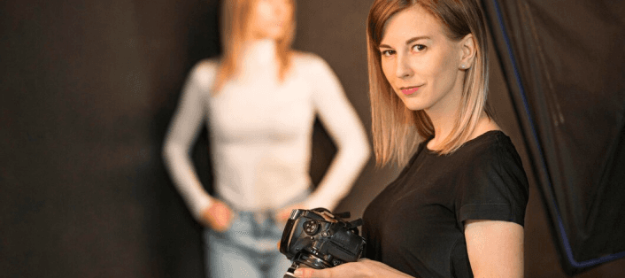 girl holding a camera