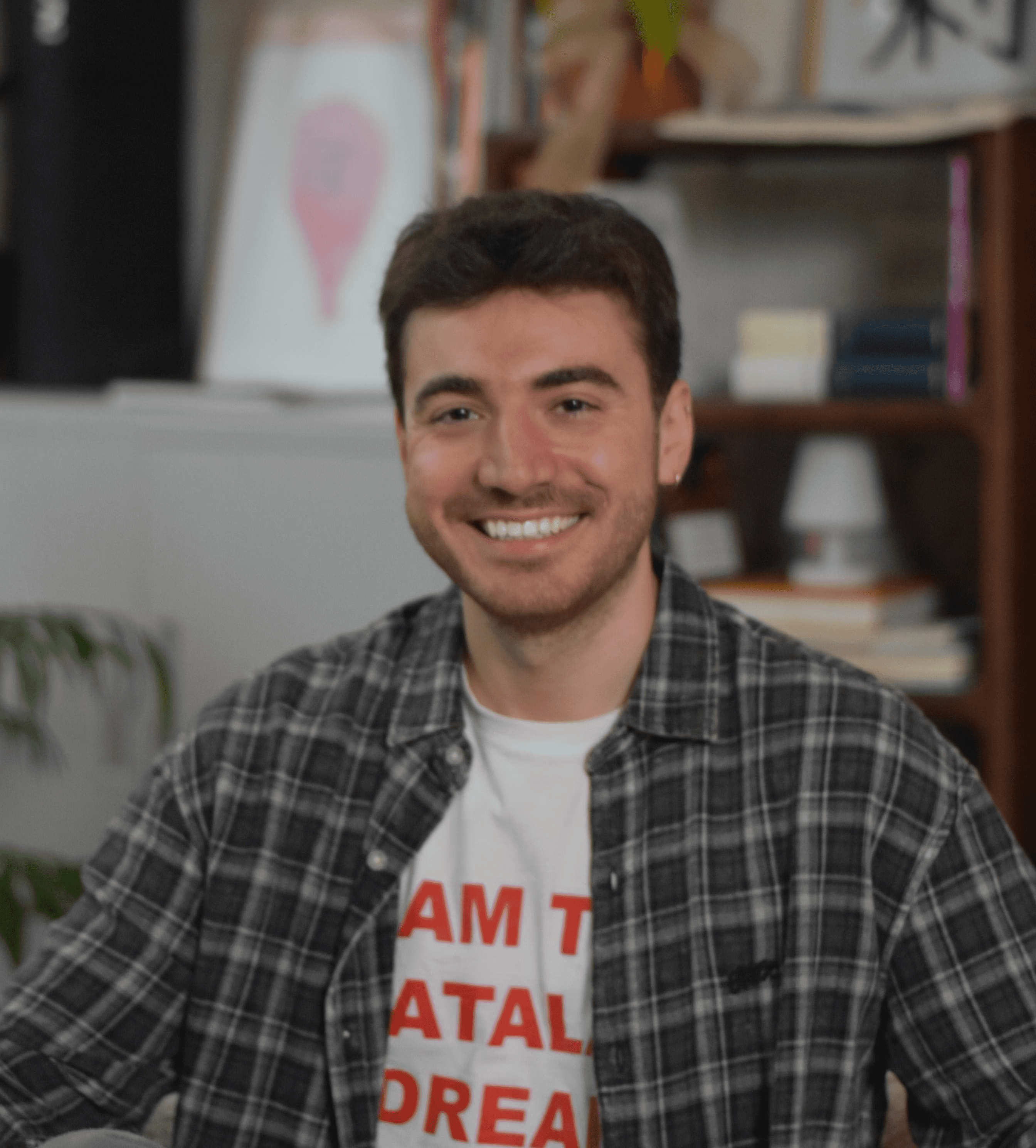 Portrait of a small brown dog on yellow background