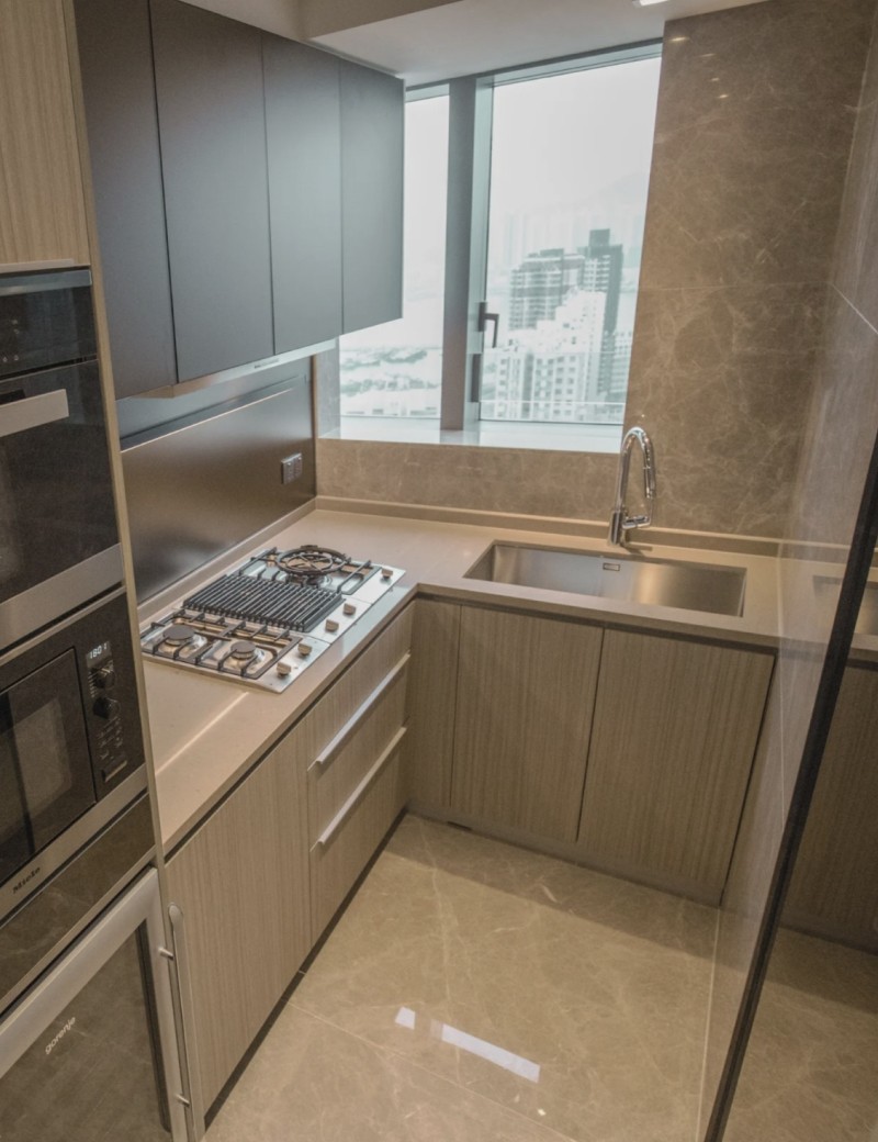 white ceramic mug on brown wooden table