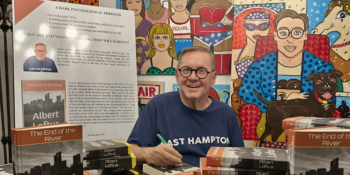 Author Albert Loftus signs copies of his novel The End of the River, reflecting his creative journey and storytelling passion.