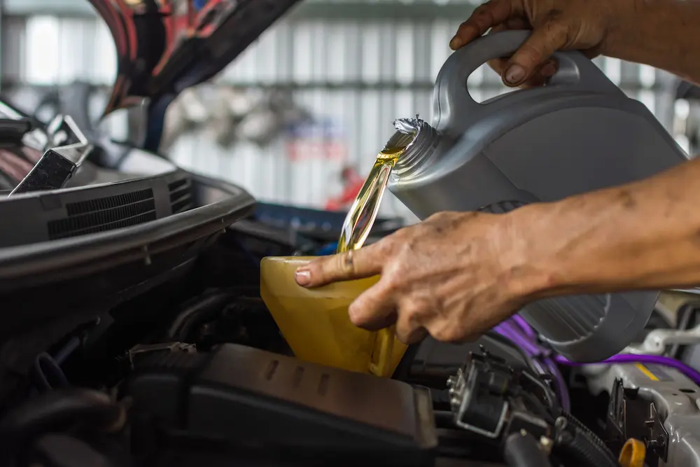 adding lubricant to a car