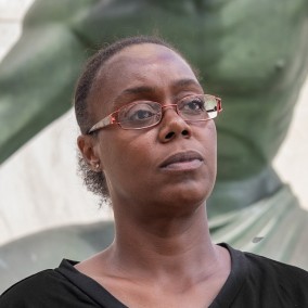 Possible member looking away from the camera.