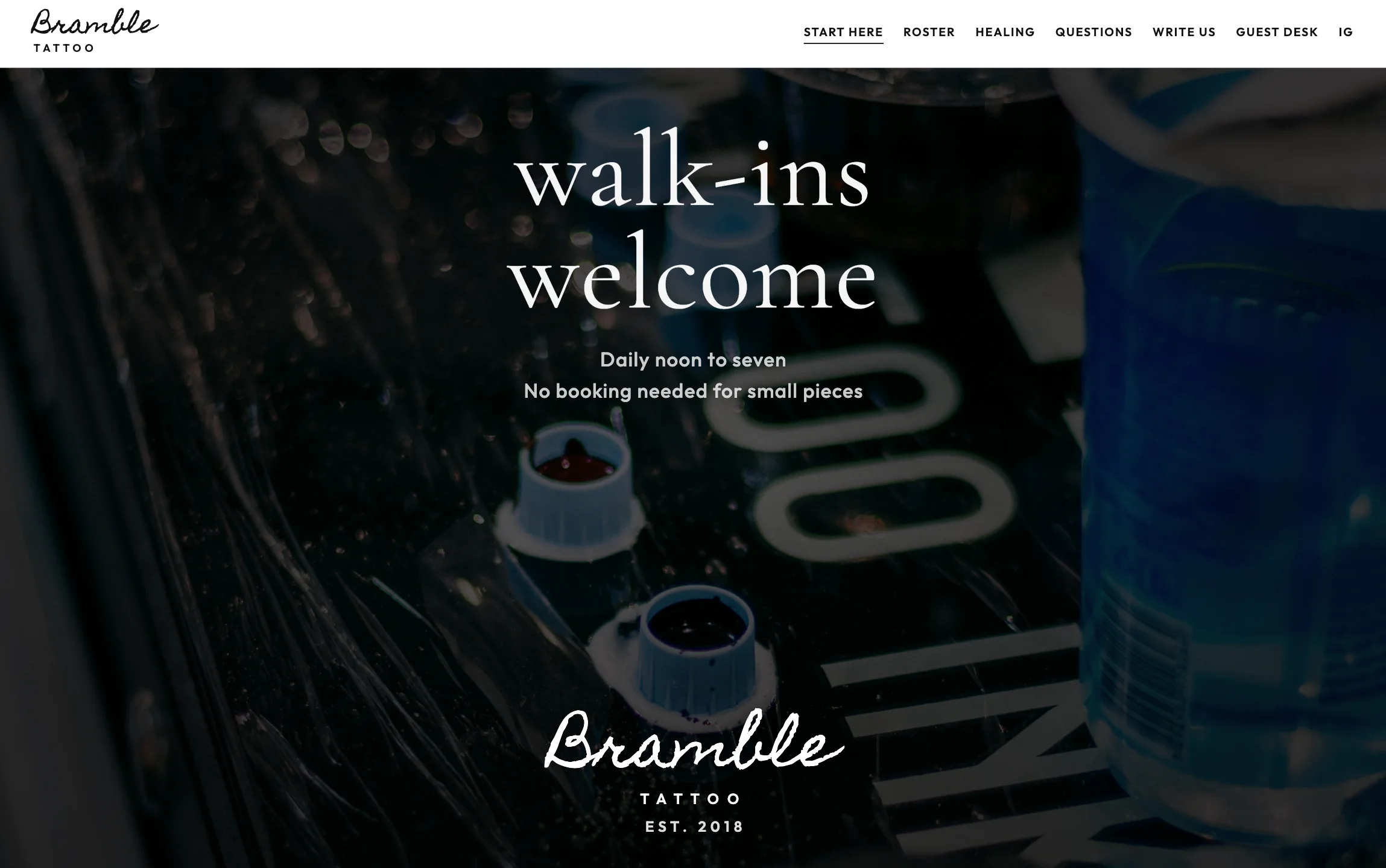 Desktop view of a tattoo studio website with a dark elegant design