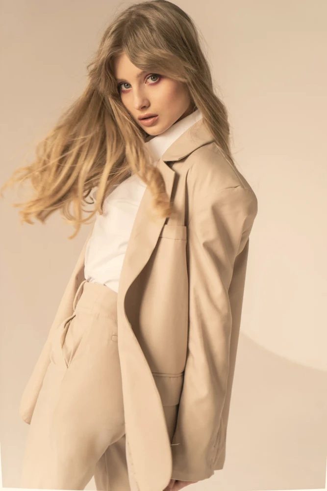 Beige suit, turning pose