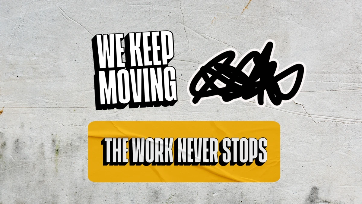 National Partnership stickers reading We Keep Moving and The Work Never Stops.