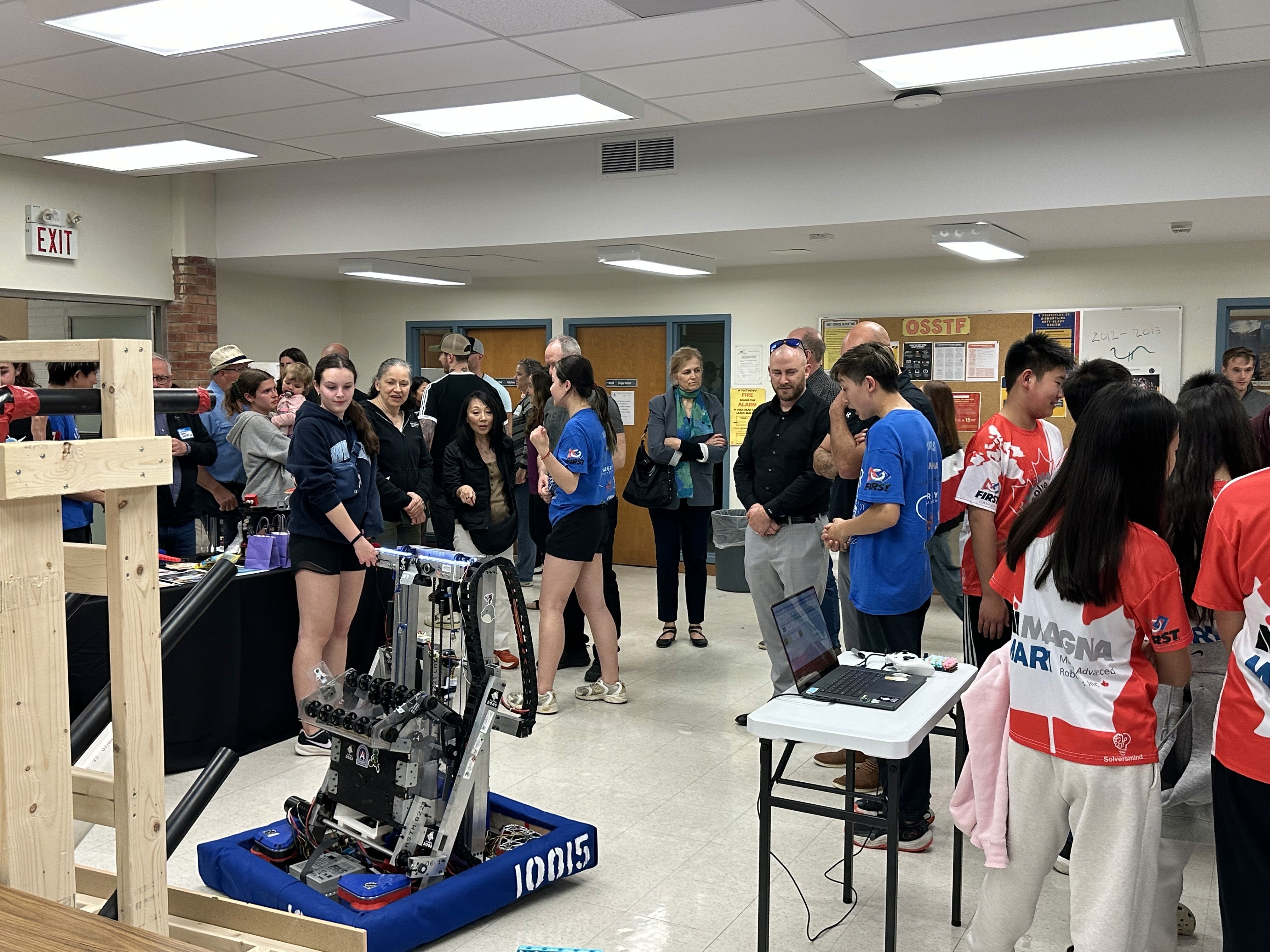 Led by Ryan Zhang, FRC team 10015 Bubbles and FLL team Solvers of X & Y showcase their 2025 season robots to Alumni of Dr. G.W. Williams SS
