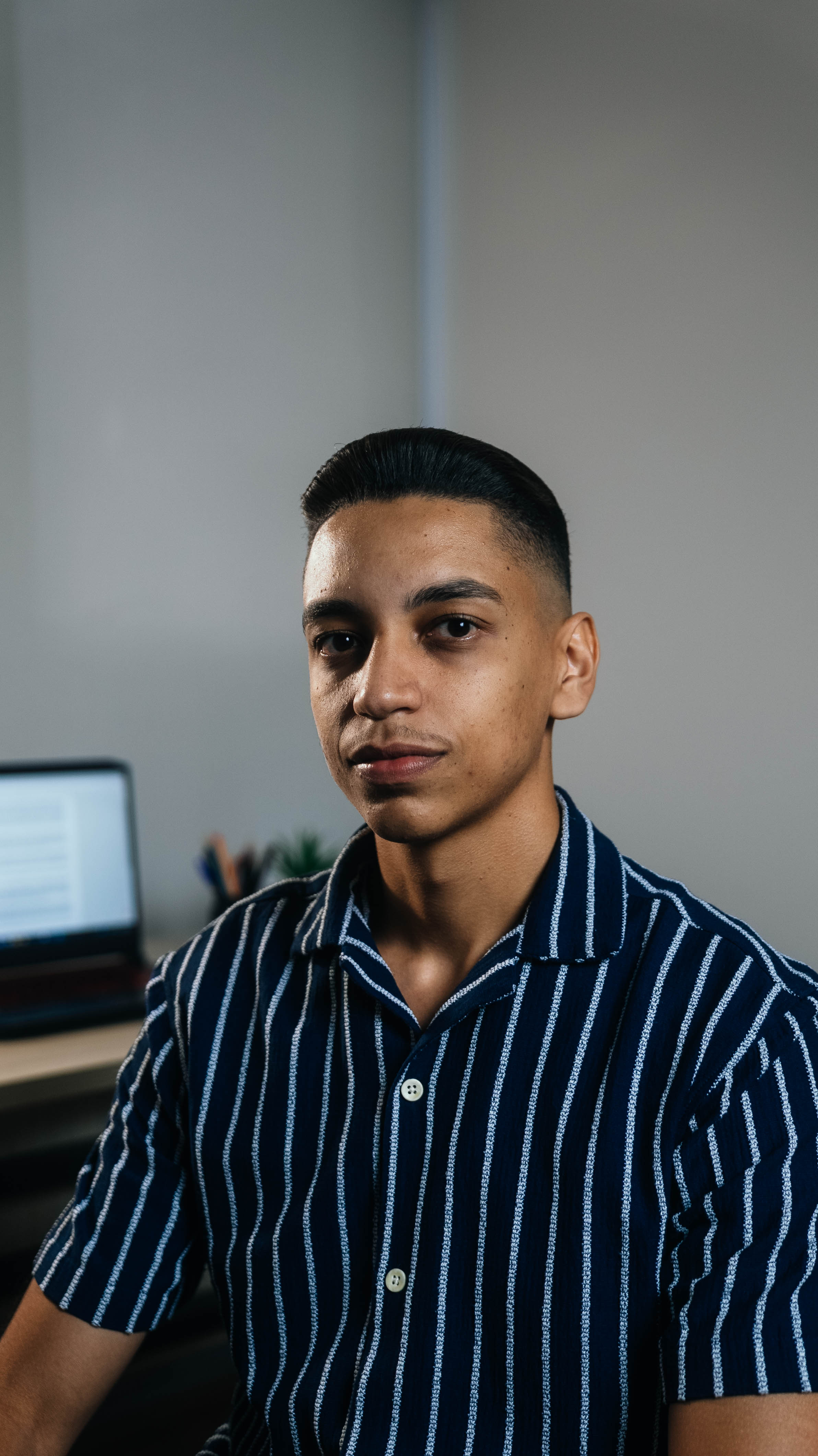 Portrait of a young man on a blue background