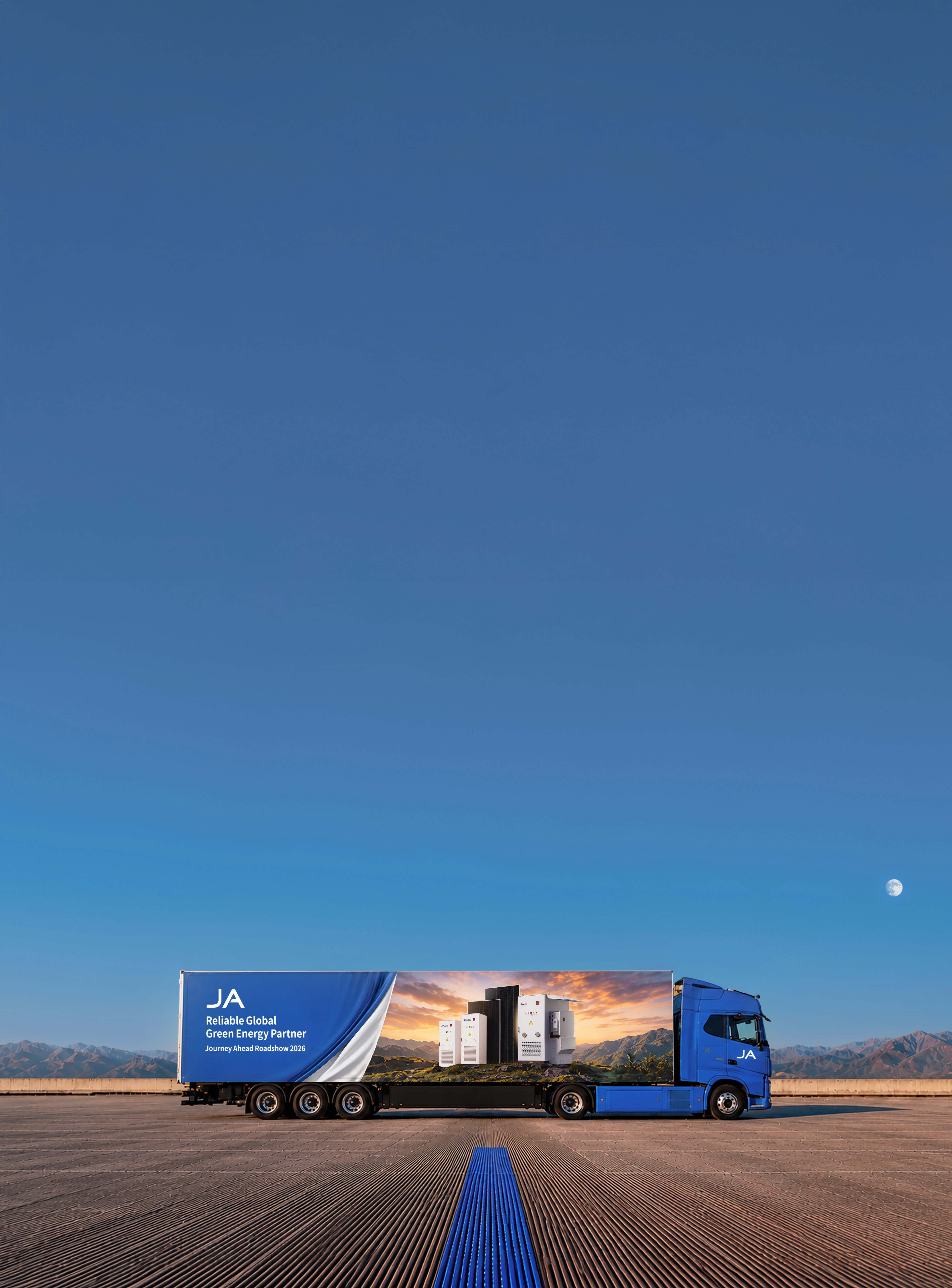 JA branded truck centered on an empty tarmac at dusk