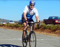 Andrew riding his bike