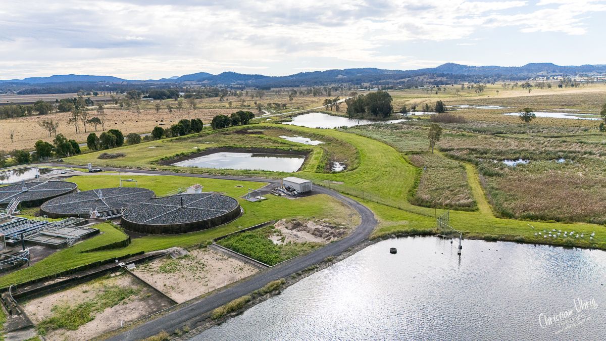 Completed sewage treatment plant facility integrated into the surrounding landscape, delivered through Uminex project management services