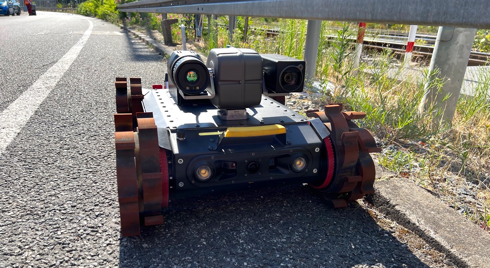 Ross Robotics tracked inspection robot carrying optical and thermal cameras outdoors