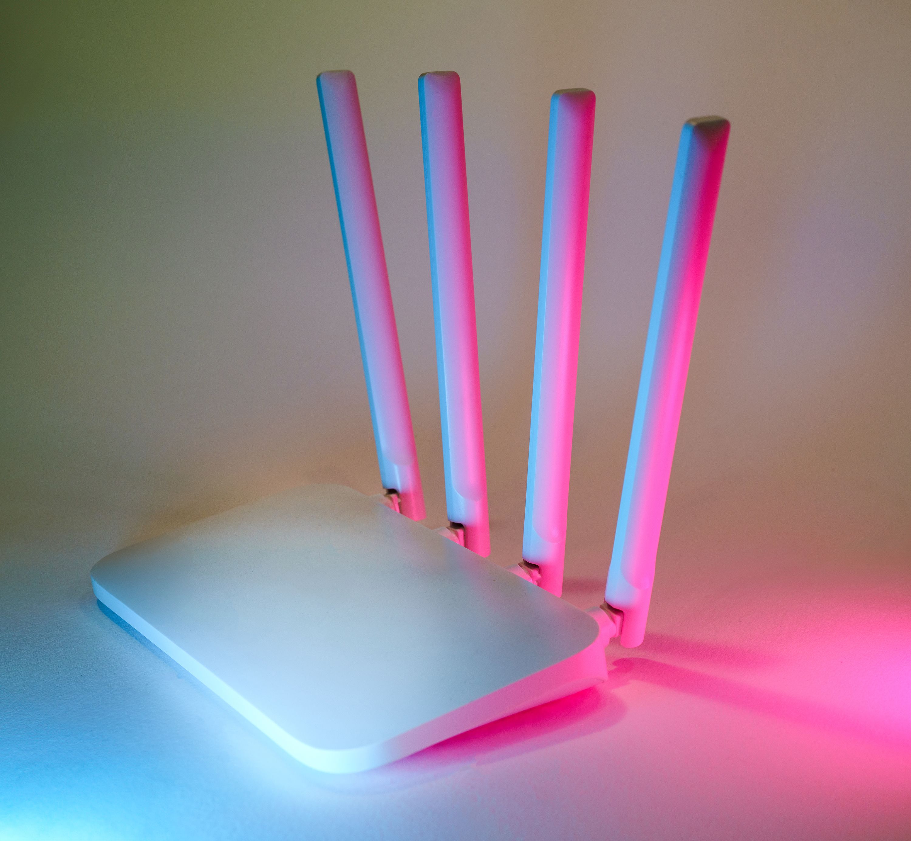 a-sleek-wireless-router-enhanced-by-vibrant-neon-lights,-showcasing-cutting-edge - jakub-zerdzicki (pexels)
