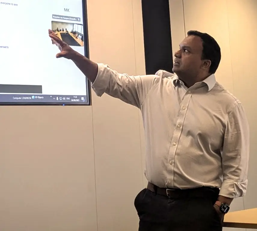 Lasitha Perera presenting during a meeting