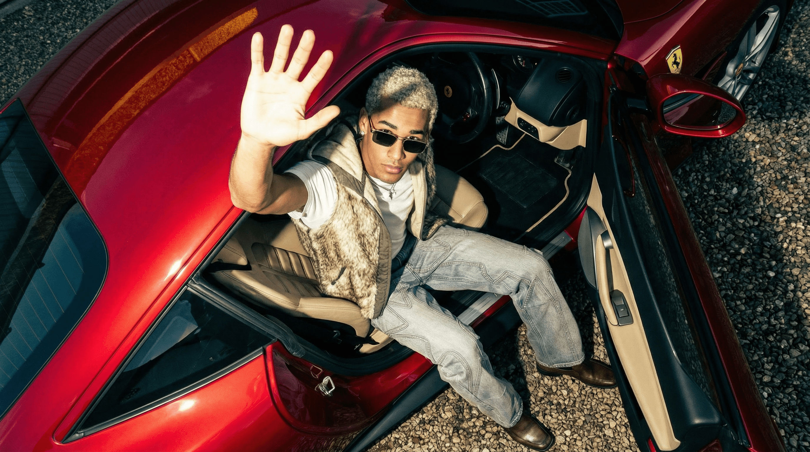 A bottle of daisy perfume with floral accents.