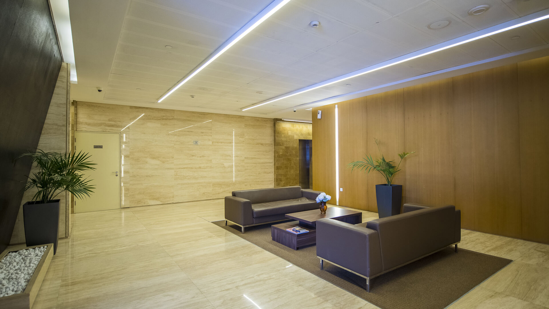 Sophisticated office lounge and waiting area inside a high-end Business Bay commercial property.