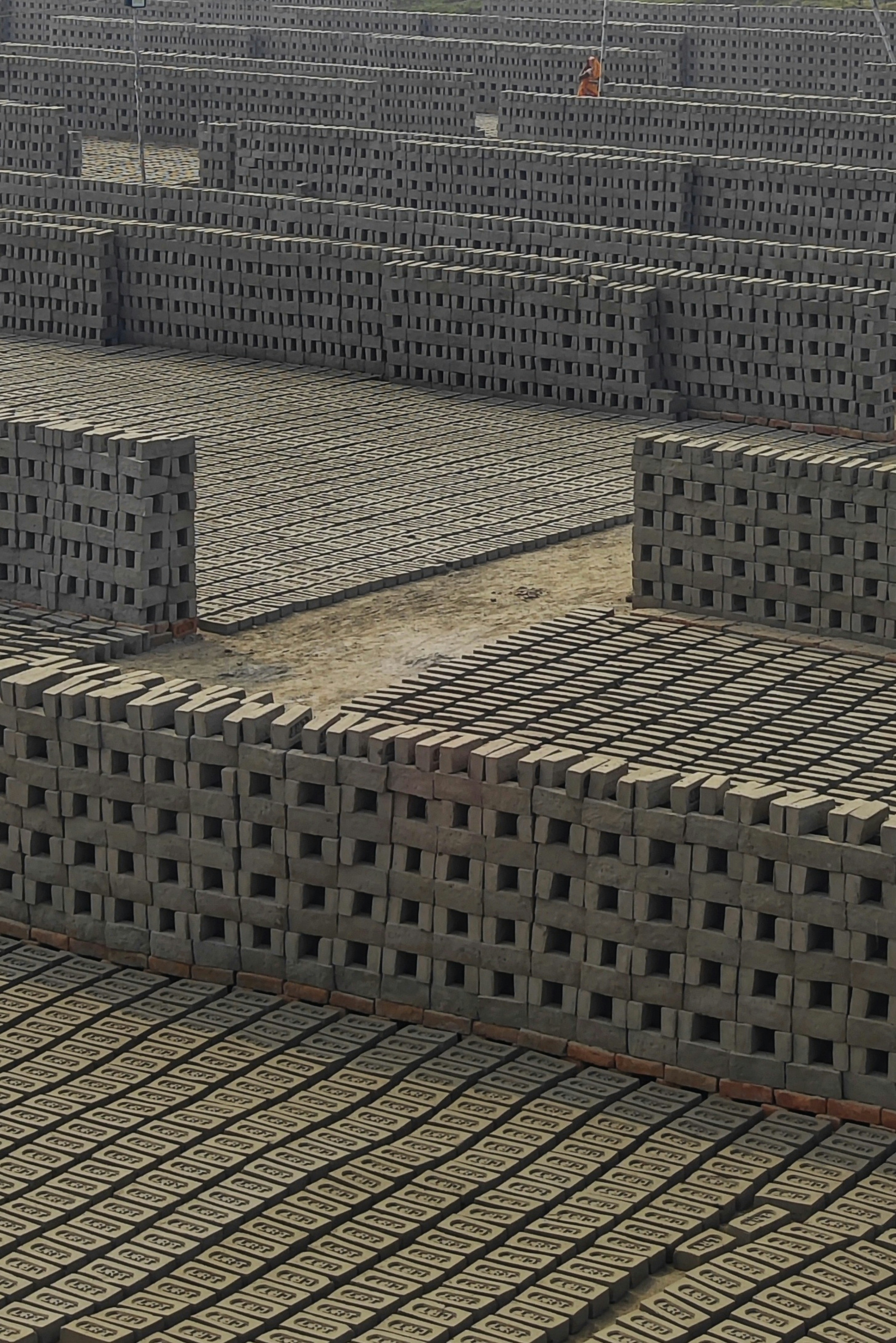 A large number of cinder blocks stacked together