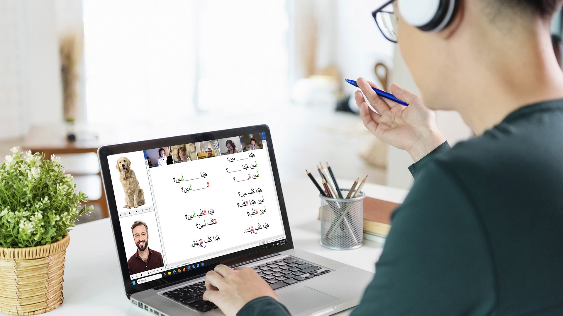 person taking online class - How To Speak Arabic 