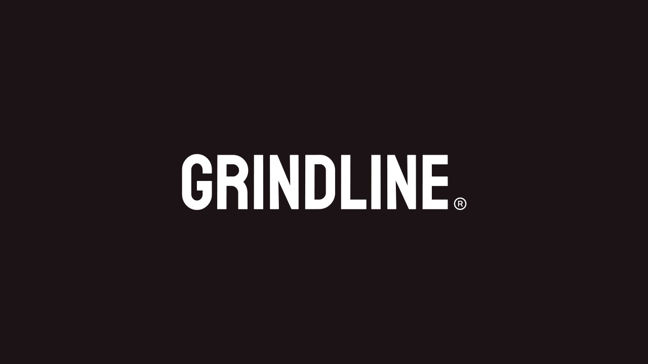 White uppercase “GRINDLINE” wordmark centred on a solid black background.