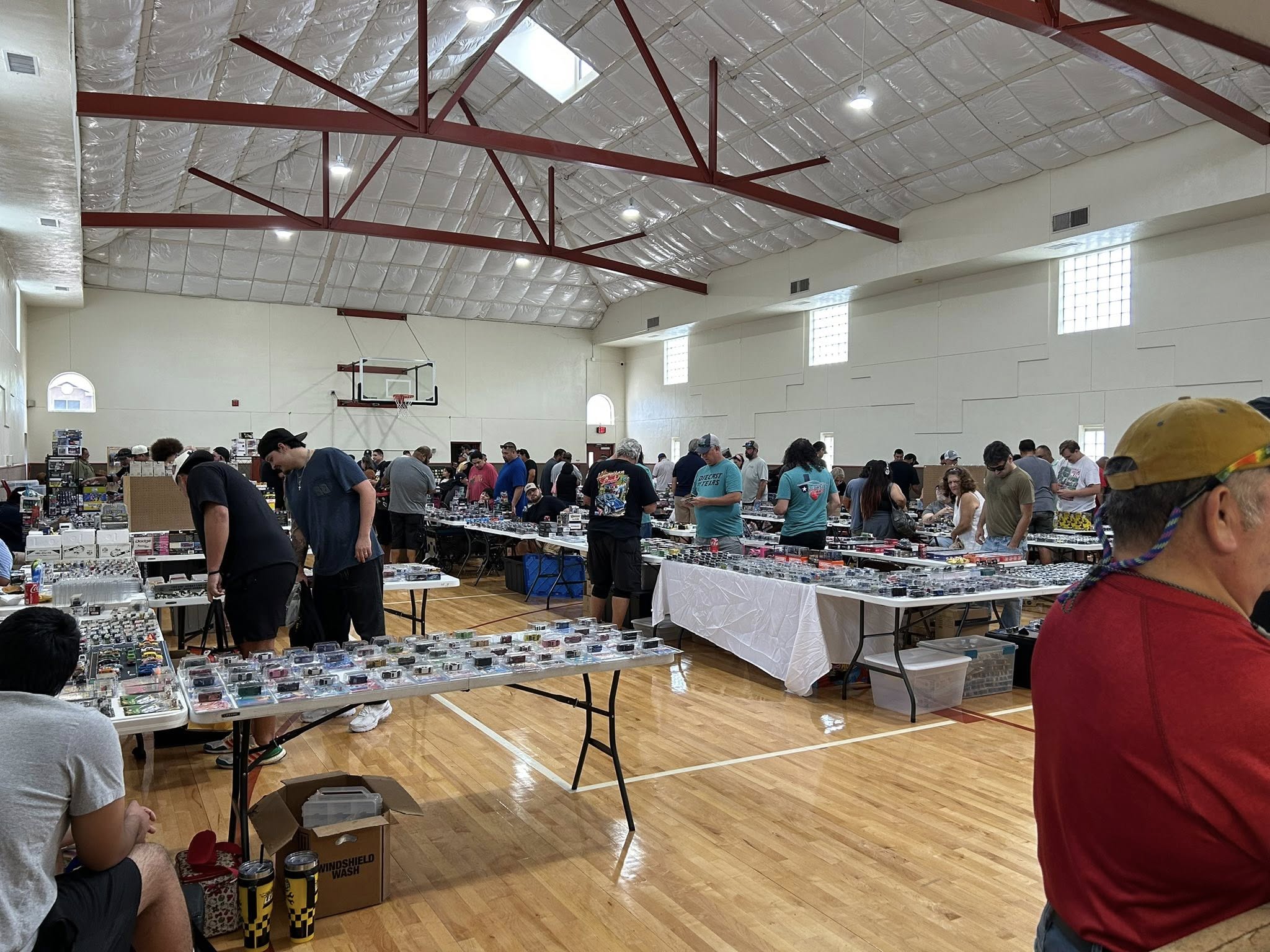 tables set up in gymnasium