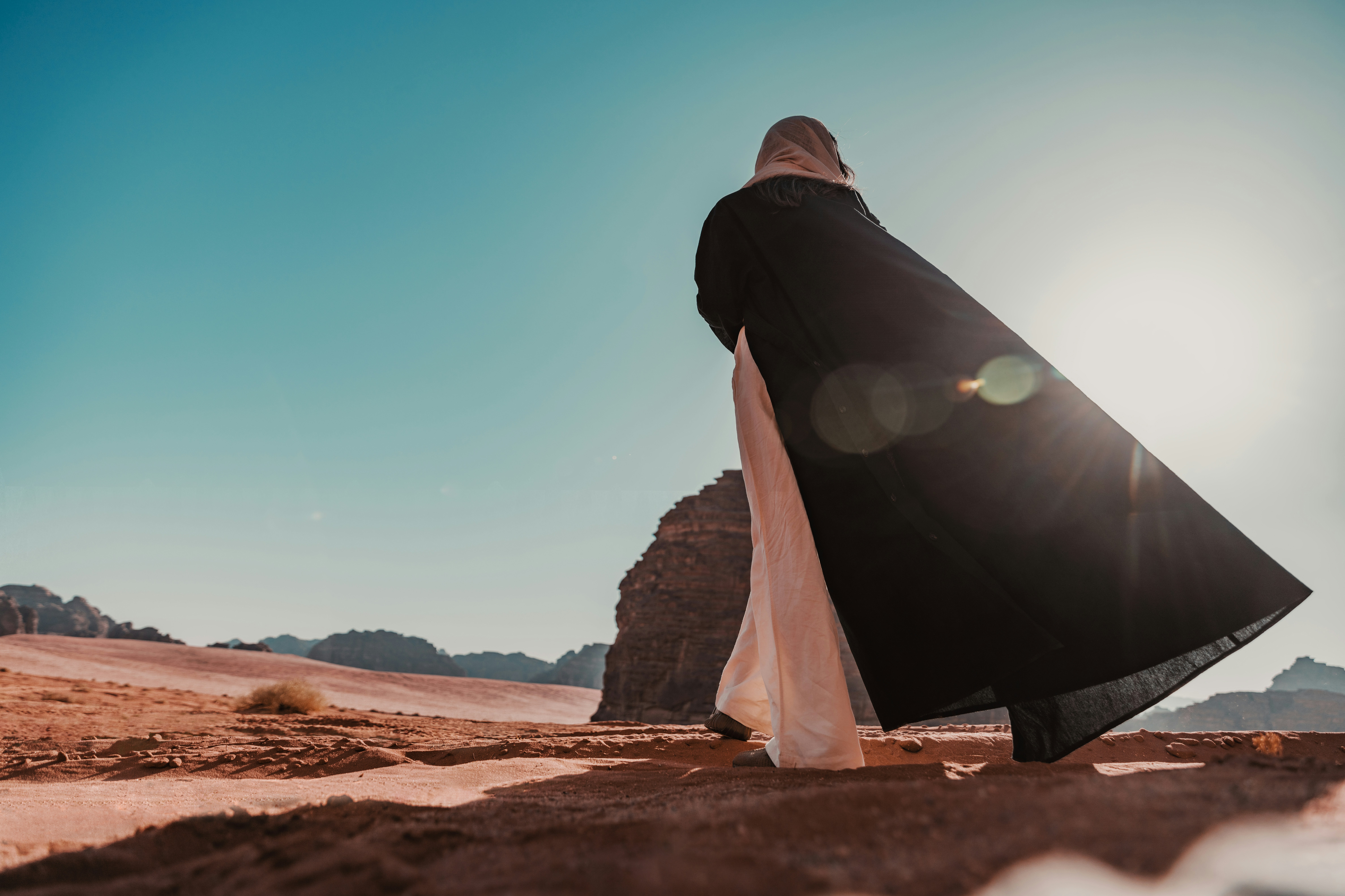 a person walking in the desert