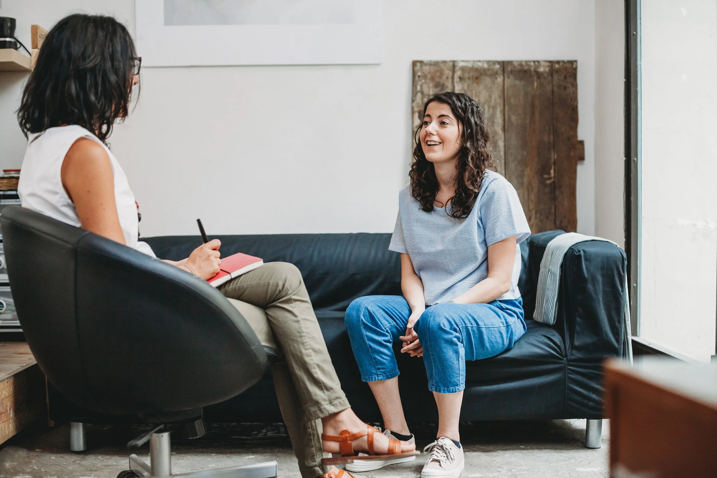 Adult client participating in an adult therapy session with a licensed therapist