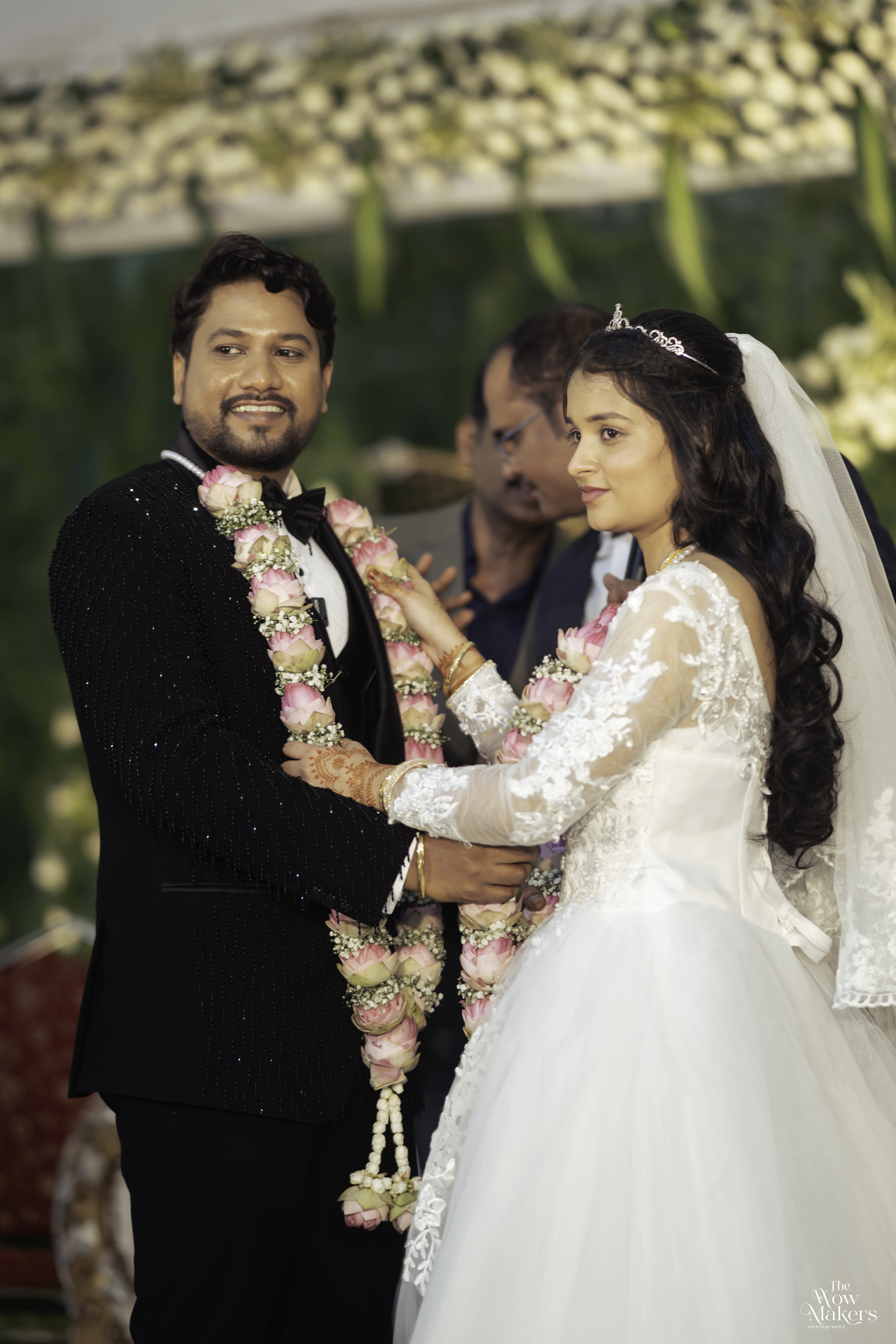 Christian wedding ceremony with bride in white gown and veil, photographed by Wow Makers wedding photography in Hyderabad, India.
