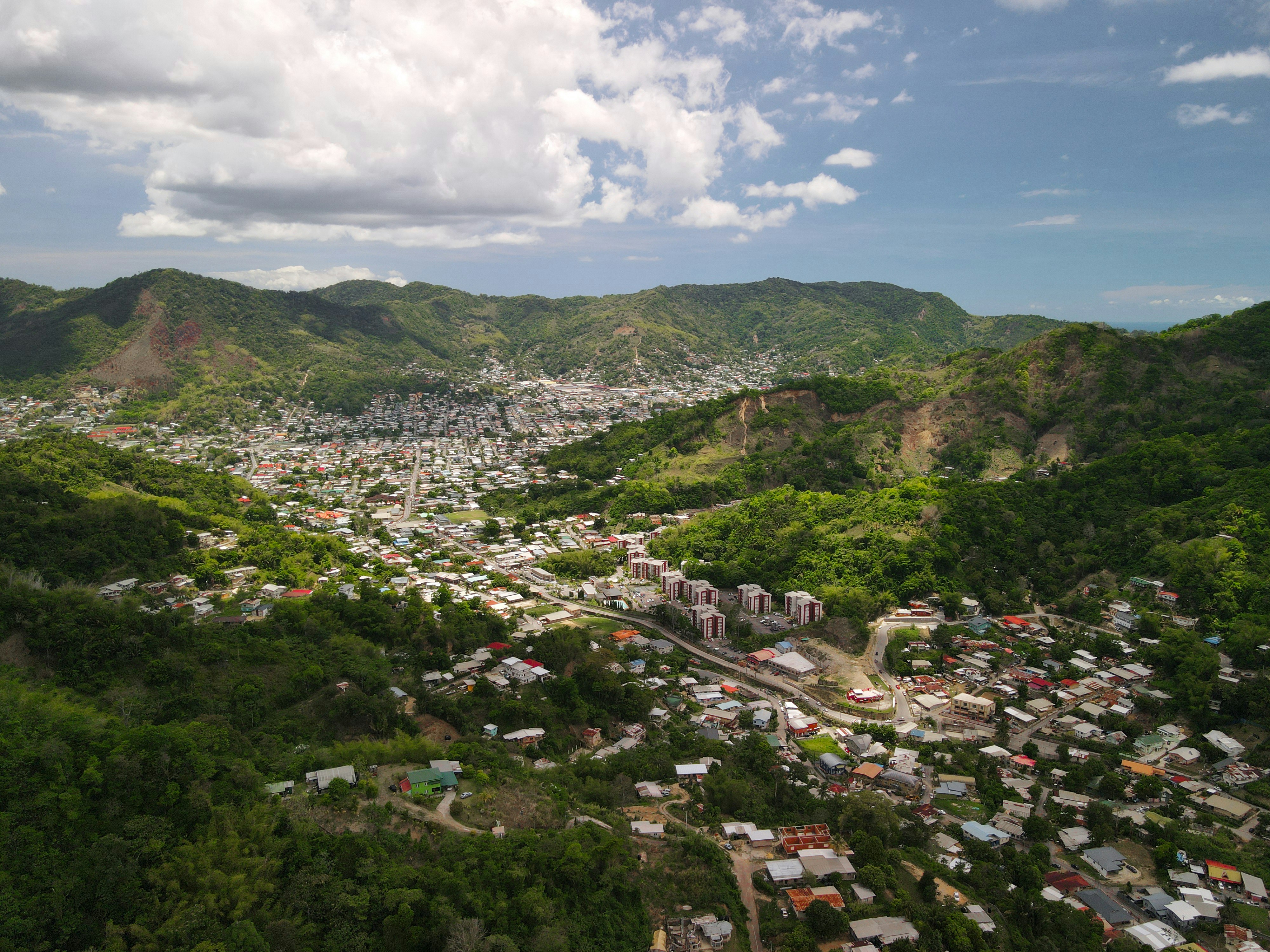 a view of a small town in the mountains