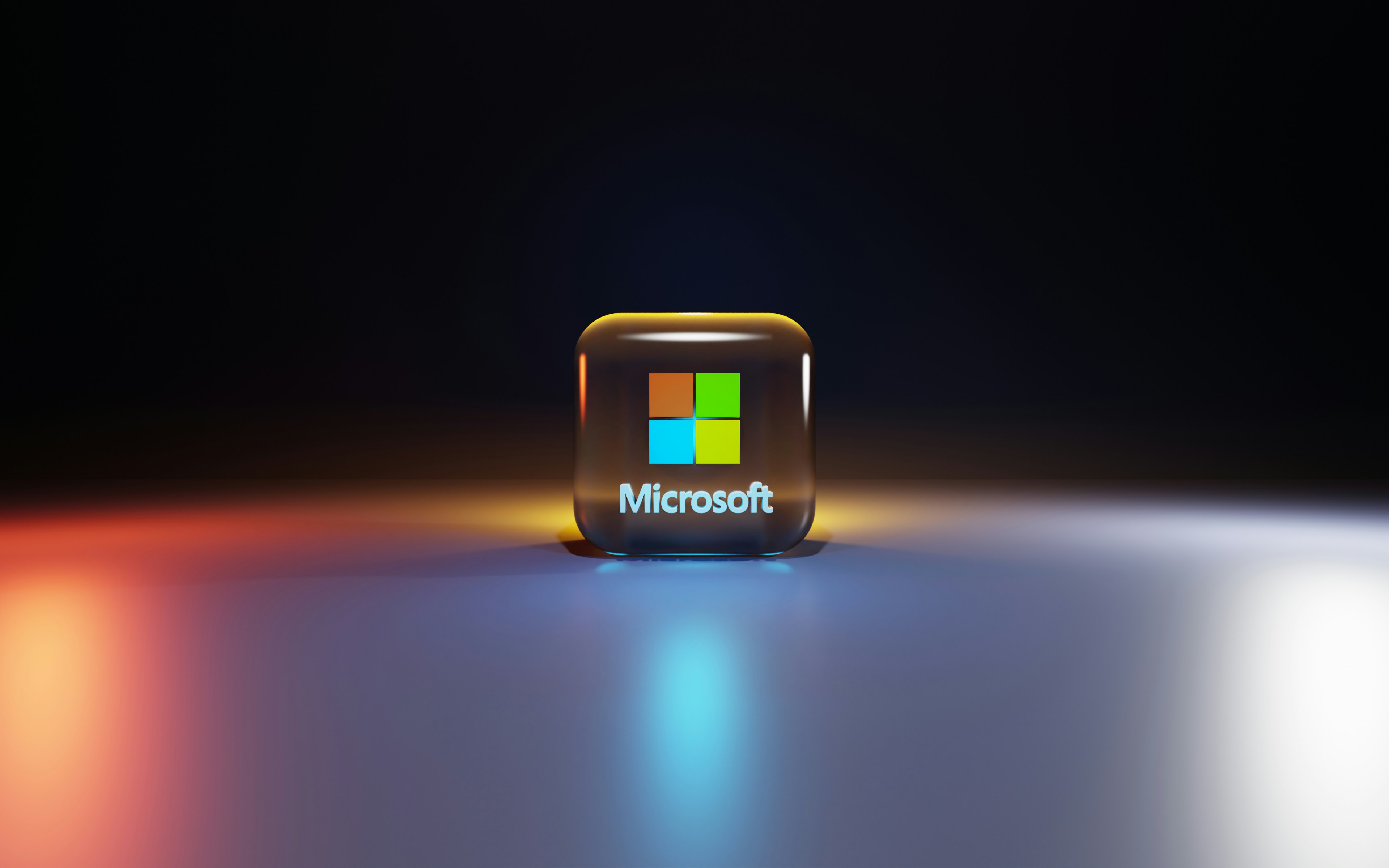 Microsoft logo icon with colorful Windows squares floating in a dark environment with dramatic lighting effects