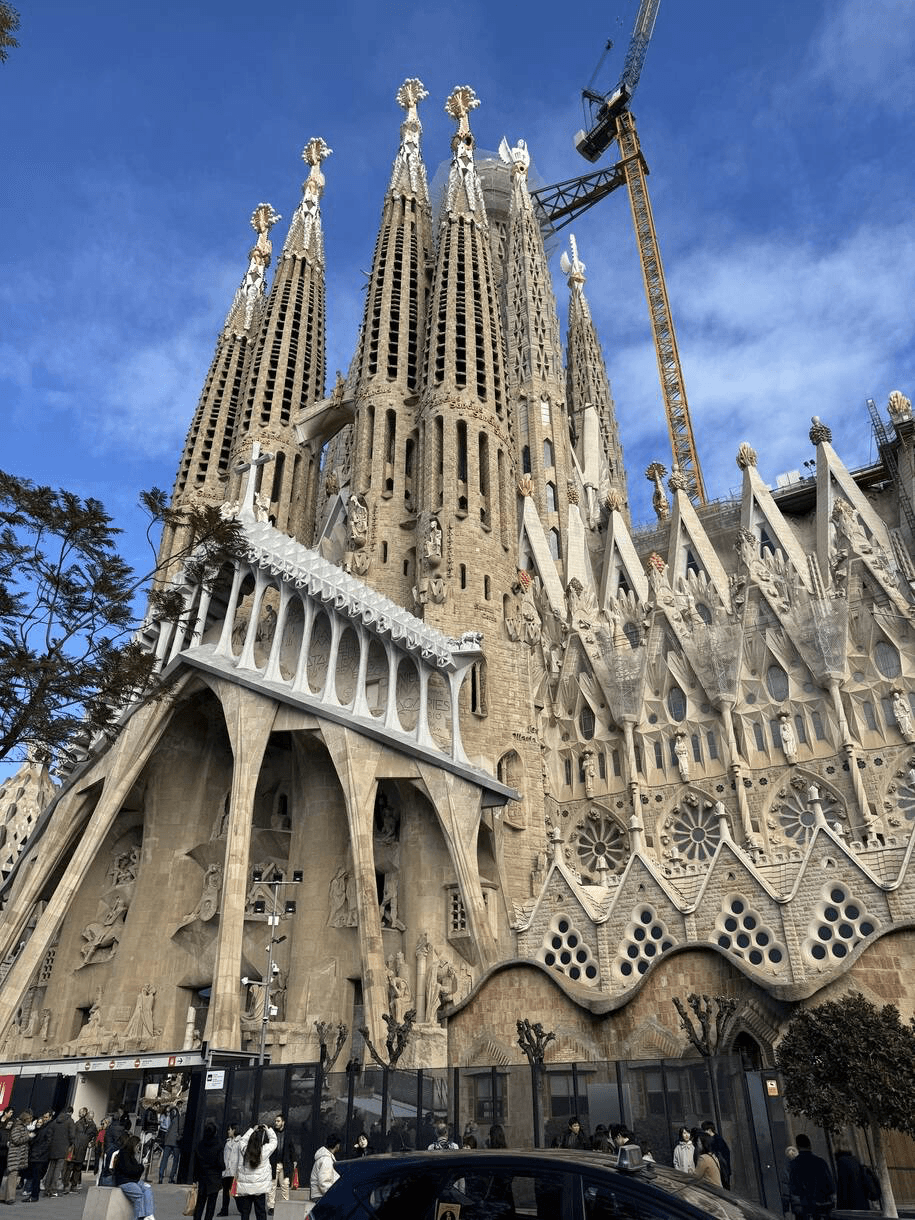 people in a large building with Tate Modern in the background