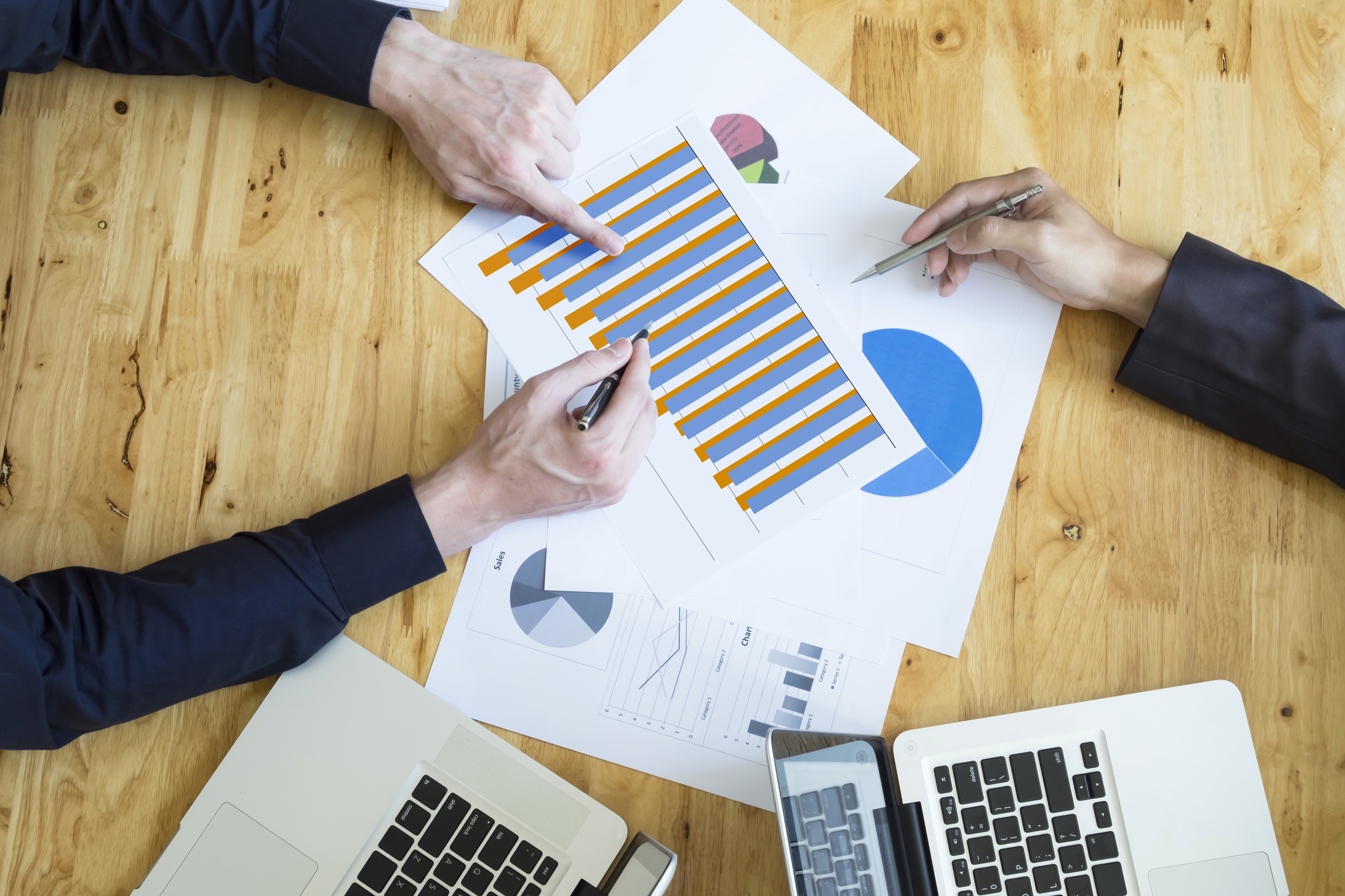 Celebratory handshake between Neon Apps and RevenueCat partners during the official partner announcement event.