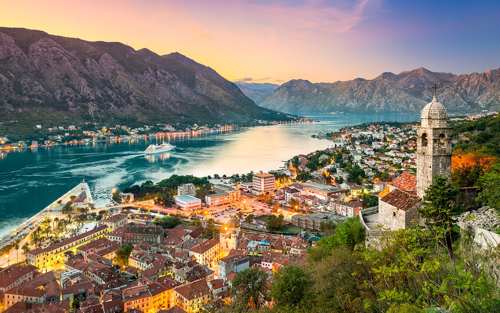 Kotor Bay view with historic buildings and mountains in Montenegro.