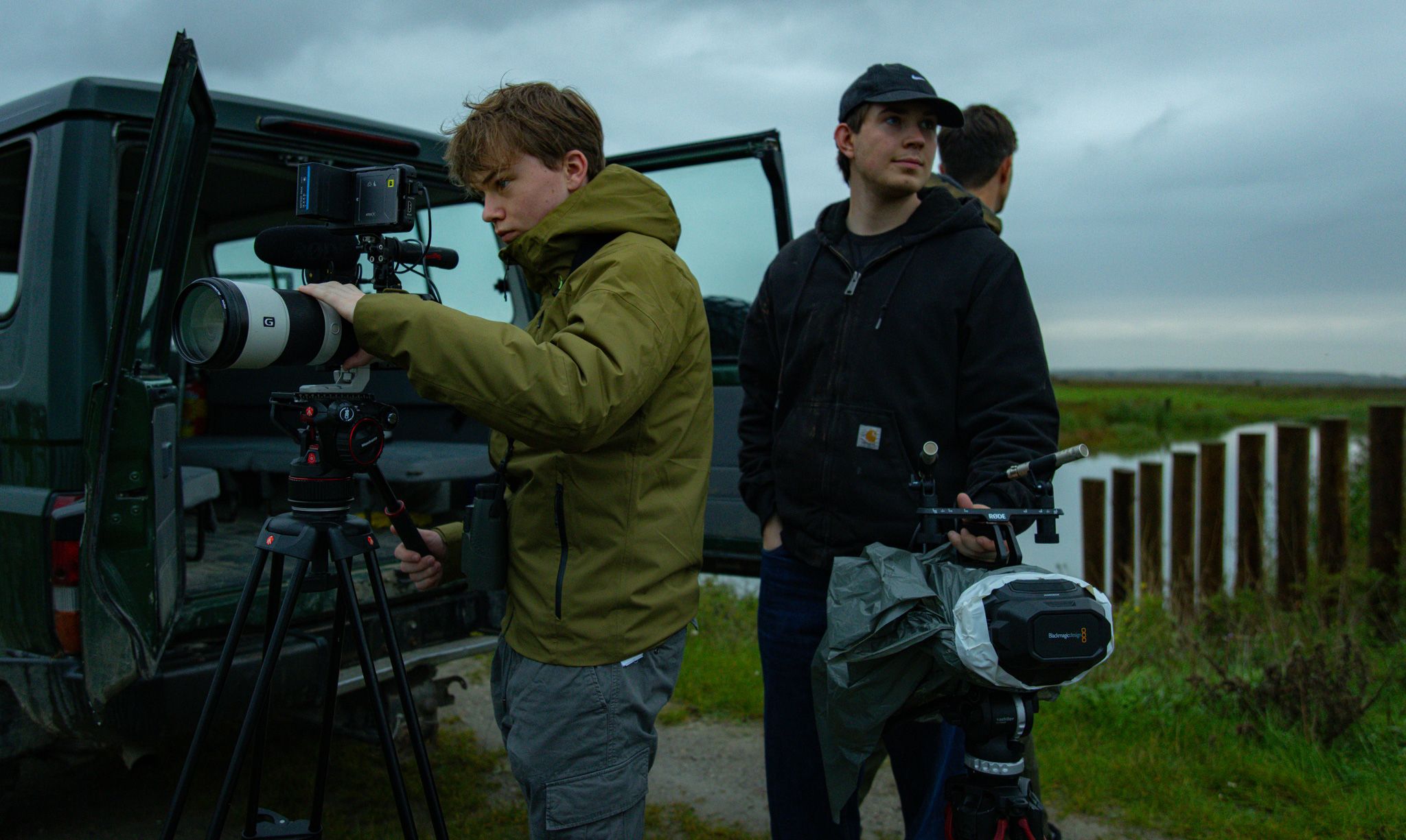 Interior of a cafe or workspace with several people at tables