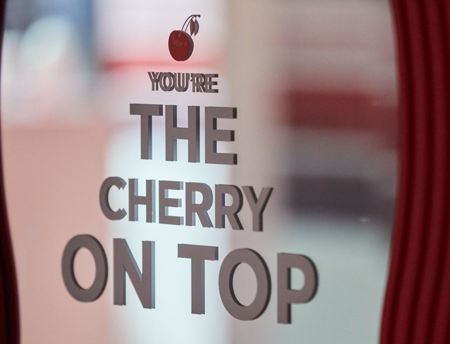 Close up of cut vinyl graphics on a mirror