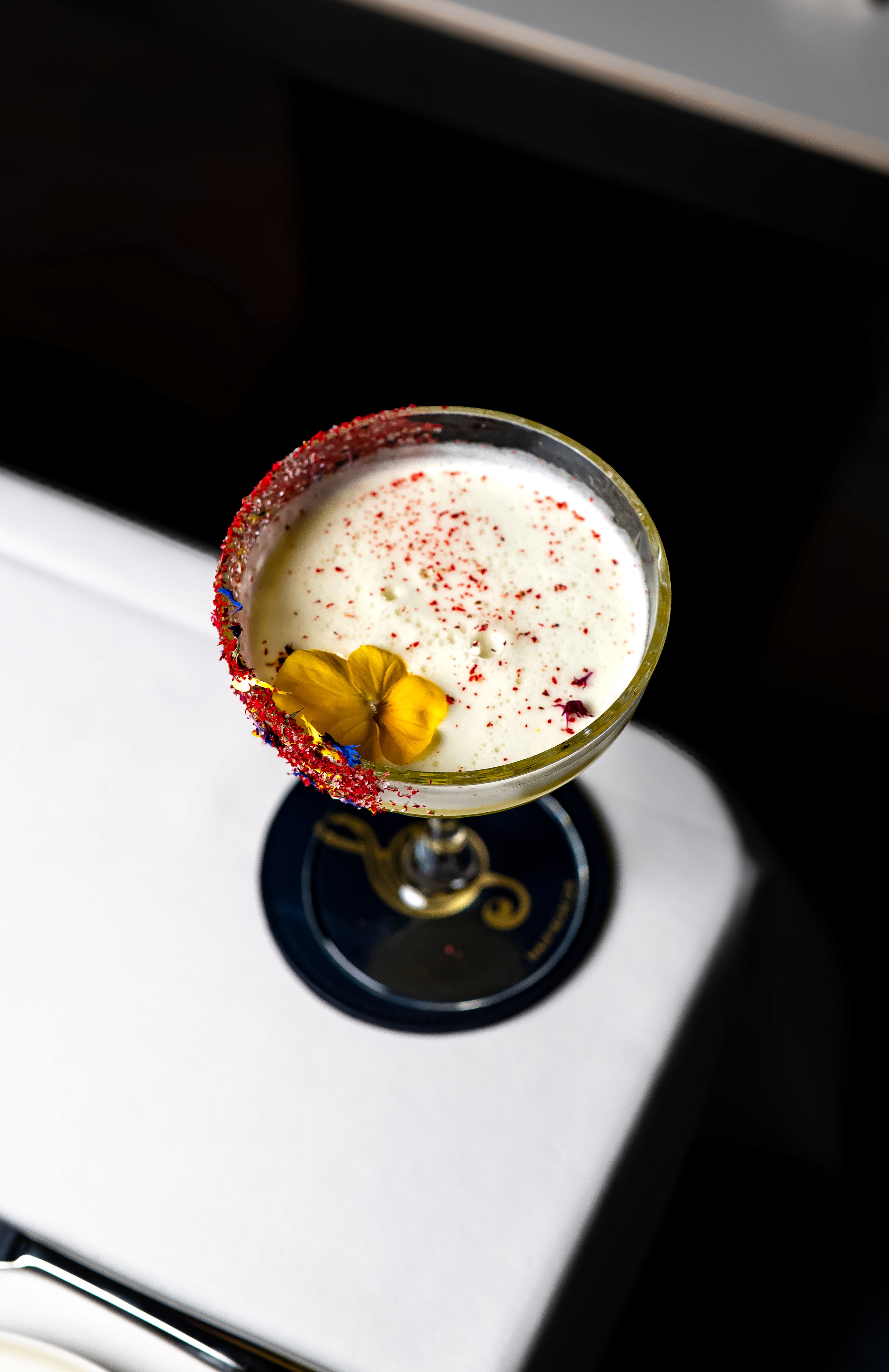 person writing on a piece of paper